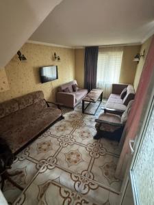 Гостиная зона в Borjomi Cozy Cottage