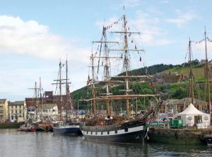 a group of boats docked in a harbor at Birks Terrace - 2 Bedroom - Sleeps 4 in Cleator Moor