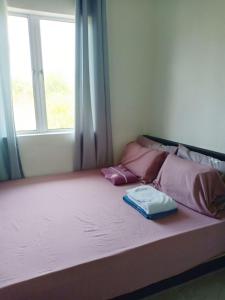 Ένα ή περισσότερα κρεβάτια σε δωμάτιο στο Dahlia Homestay 3 +12 φωτογραφίες