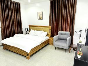 Ένα ή περισσότερα κρεβάτια σε δωμάτιο στο DUWIJAY BnB