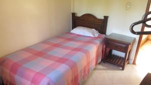 Postel nebo postele na pokoji v ubytování Posada De Los Santos Hotel Rural, La Candelaria