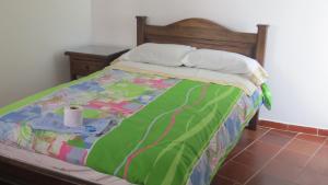 Postel nebo postele na pokoji v ubytování Posada De Los Santos Hotel Rural, La Candelaria