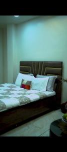 Giường trong phòng chung tại Mulyas farms