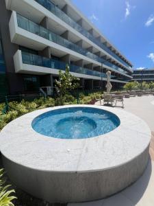 Bazén v ubytování Beach Class Summer Porto de Galinhas Praia do Cupe nebo v jeho okolí + 44 fotografií