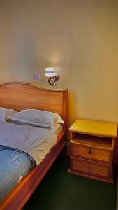 Postel nebo postele na pokoji v ubytování SK Emanyatta Camp