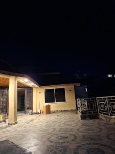 a building at night with a large patio at 4 Bedroom Penthouse - ELEV8 in Murree