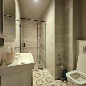 Koupelna v ubytování lux-deluxe city apartment + 41 fotografií