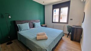 Ένα ή περισσότερα κρεβάτια σε δωμάτιο στο Captivating 2-Bed Apartment in Tunis +35 φωτογραφίες