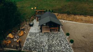 an overhead view of a house with a black roof at Chalet Tukhlya in Tukhlya