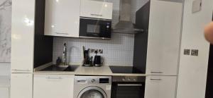 アクラにあるACCRA MODERN HOMES CoZY STUDIO,SIGNATURE APARTMENTのギャラリーの写真