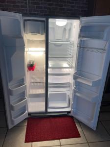 an open refrigerator with its door open and its door at Southern Perk -Coffee & Caffeine in Crestview