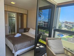 Postel nebo postele na pokoji v ubytování Viva Muro Alto no Cais 208 + 56 fotografií