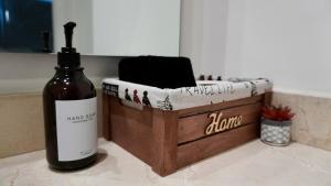 a bottle of wine sitting on top of a counter at Modern, with Ocean and Mountain View in Puerto Vallarta