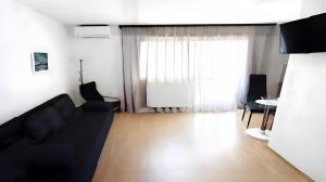 O zonă de relaxare la Amélie Apartments +6 fotografii