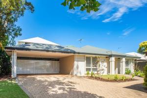 a house with a driveway in front of it at Peaceful Garden Hideaway - Swim, Hike and Unwind in Dunsborough
