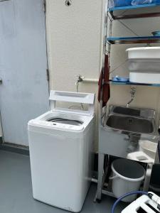 Φωτογραφία από το άλμπουμ του 101 Melon Home 難波日本橋 徒歩10分 黒門市場 徒歩5分 心斎橋 1駅 広いお部屋 στην Οσάκα