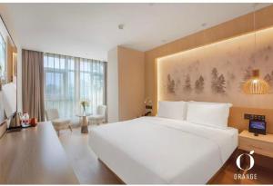 Katil atau katil-katil dalam bilik di Orange Hotel Beijing Jianguomen Baiqiao Street
