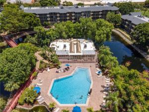 an overhead view of a swimming pool at a resort at Park Shore Resort-1st Floor Condo-Park 101 in Naples