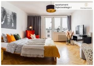 a bedroom with a bed with an elephant on it at PiotrApartments - Big City Life Apartments in Central Warszawa in Warsaw