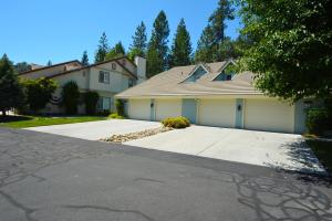 a house with a driveway in front of it at King- Lake Area in Bass Lake
