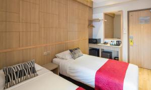 Ένα ή περισσότερα κρεβάτια σε δωμάτιο στο 81酒店尊贵之星