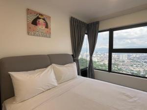 Ένα ή περισσότερα κρεβάτια σε δωμάτιο στο Arte Cheras By Dream Stay +131 φωτογραφίες