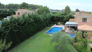 Πισίνα στο ή κοντά στο Sani Waterscape Villa