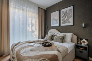 Katil atau katil-katil dalam bilik di Electra Apartments - LoftAffair