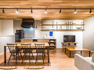 a kitchen and dining room with a table and chairs at Rakuten STAY HOUSE x WILL STYLE Takasaki 102 in Takasaki