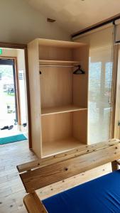 a bedroom with a built in book shelf at Uruma - House - Vacation STAY 16594 in Uruma