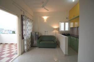 O bucătărie sau chicinetă la Dhriti - 1BHK and 2 BHK Apartment stay +14 fotografii