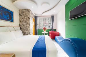 TV a/nebo společenská místnost v ubytování Belvilla Near Lotte Mart Formerly Sunrise Hotel Trung Son