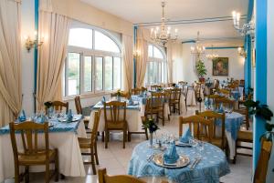 Restoran või mõni muu söögikoht majutusasutuses Il Gattopardo Hotel Terme & Beauty Farm