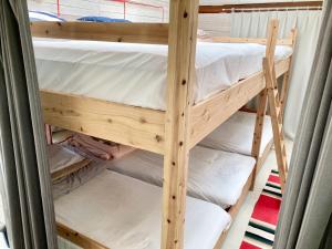 a couple of bunk beds in a room at Fukuoka - House / Vacation STAY 4898 in Fukuoka