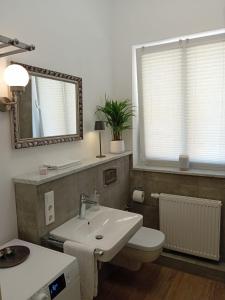 Et badeværelse på Altbau im Herzen der Stadt + 10 billeder