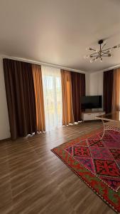 TV a/nebo společenská místnost v ubytování Agat cottage