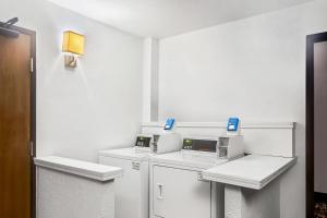 a room with three machines in a white room at Quality Inn & Suites Howe - Sturgis in Howe +33 photos