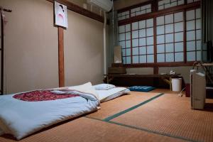 Postel nebo postele na pokoji v ubytování Honno Ryokan / Vacation STAY 60049