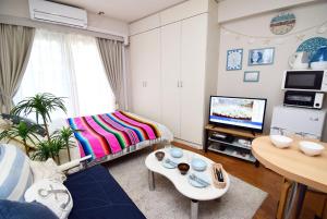 โทรทัศน์และ/หรือระบบความบันเทิงของ KITAZAWA CS HOUSE - Vacation STAY 28958v