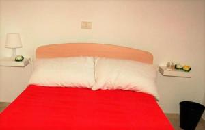 A bed or beds in a room at Gaietta