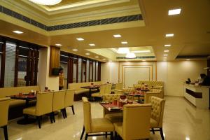 Χώρος καθιστικού στο Dhruv Elite and Banquets