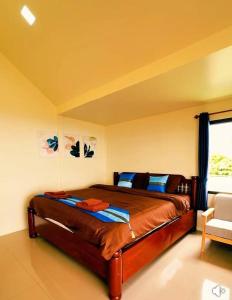 Ένα ή περισσότερα κρεβάτια σε δωμάτιο στο Leesuma Homestay