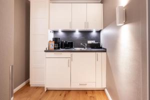 Dapur atau dapur kecil di Logierhaus K15 Appartement 3