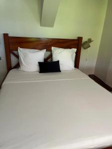 Ένα ή περισσότερα κρεβάτια σε δωμάτιο στο Appartement cosy avec piscine au François +6 φωτογραφίες