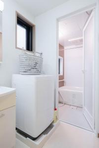 Un baño de Private House NISHIOGI 33 fotos más