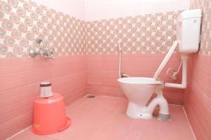 Koupelna v ubytování Bhudeve Stay Home