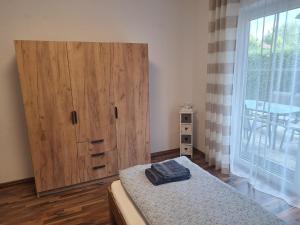 Ένα ή περισσότερα κρεβάτια σε δωμάτιο στο Ferienwohnung Sonja mit Terrasse