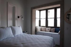 Postel nebo postele na pokoji v ubytování Sakula Hotel