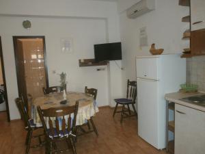Kuchyň nebo kuchyňský kout v ubytování Apartments Gorenjka