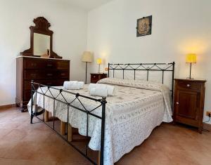 Katil atau katil-katil dalam bilik di Dimora Concept-Virginia-Spacious Apartment 50m from the Beach